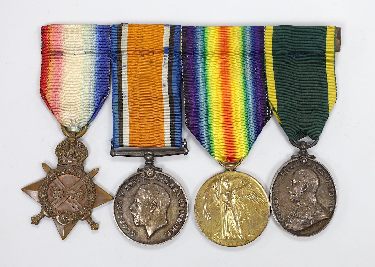 A WWI group of four including Territorial Force Efficiency Medal to 1005, SPR. F.J. STEWART. R.E.